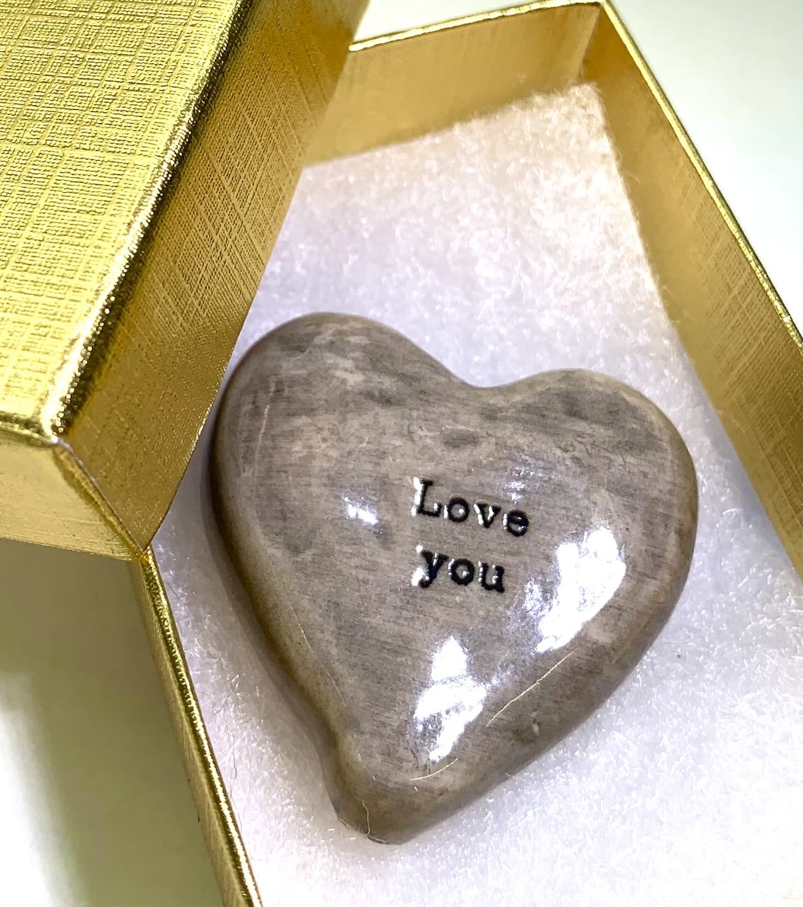 Love you heart-shaped pebble