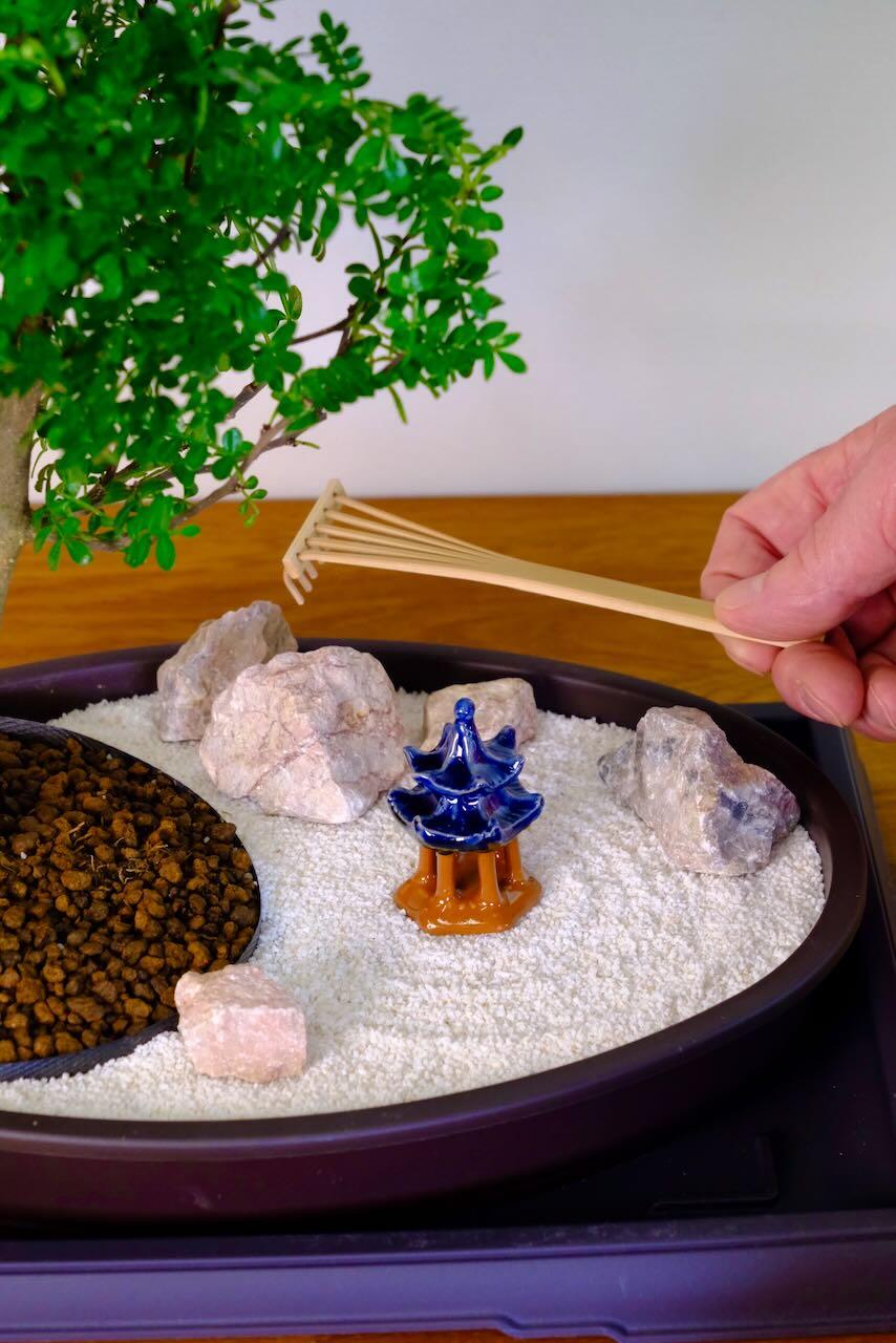 Little bamboo rake included in this mini bonsai zen garden